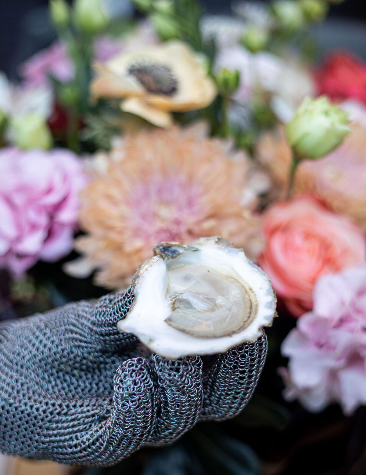Fresh oyster served by an Oystertainer at an elegant event